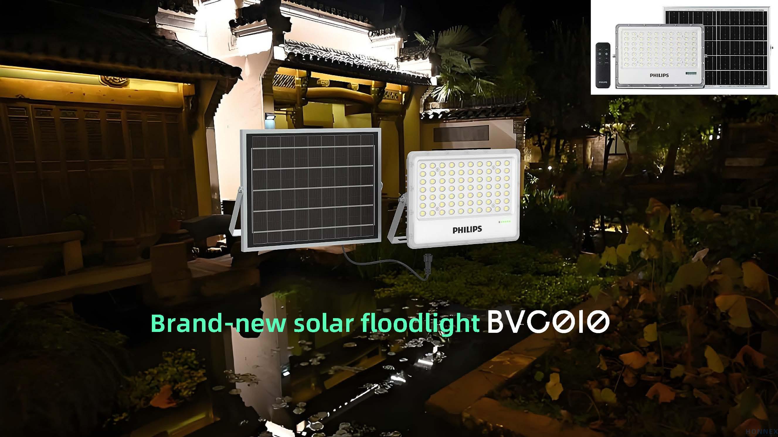 PHILIPS BVC010 LED Solar Floodlight hero shot showing night-time courtyard application with solar panel and remote