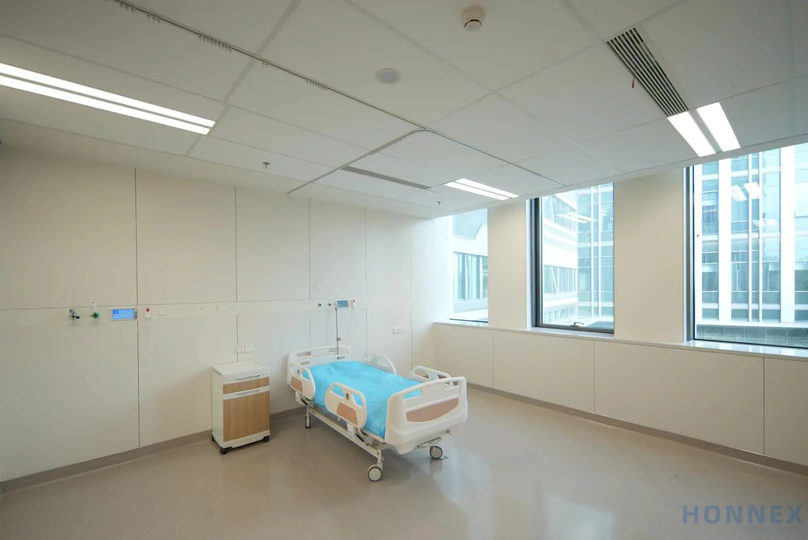 Patient room ceiling with Aura RC430 panels over the bed